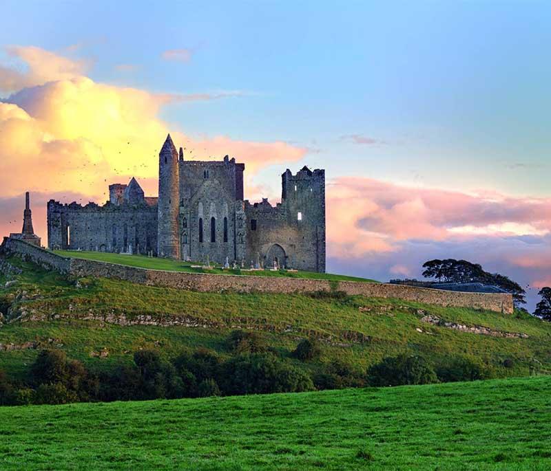Rock of Cashel, County Tipperary, a historic site with medieval buildings set on a limestone outcrop, offering stunning views