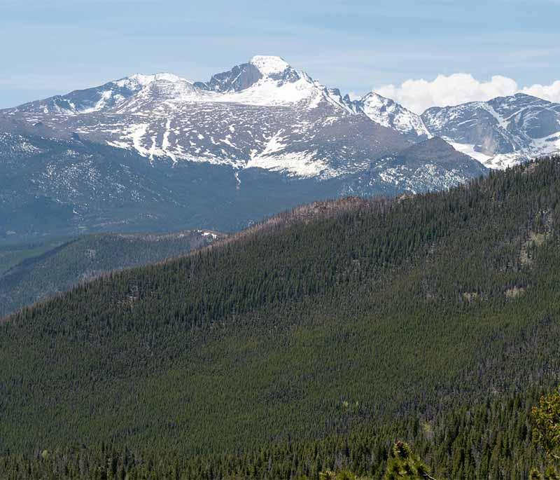 Rocky Mountain National Park: Offers breathtaking mountain views, hiking trails, and diverse ecosystems.