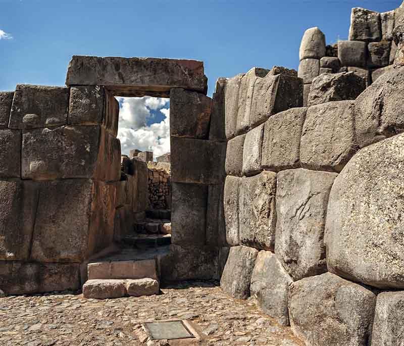 Sacsayhuaman - A ceremonial complex with massive stone walls, offering panoramic views over the city of Cusco.