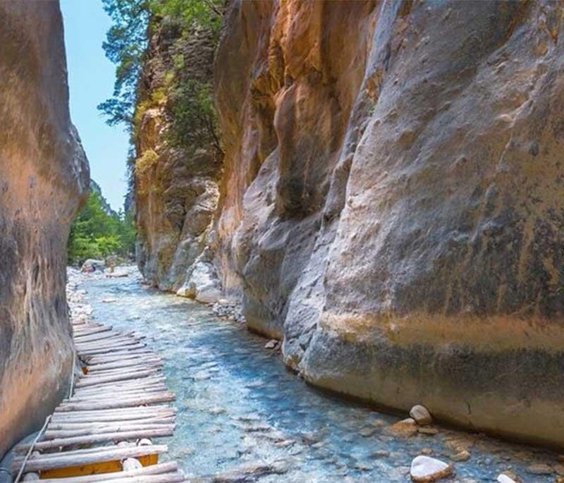 Samaria Gorge, a national park in Crete known for its stunning gorge, challenging hikes, and diverse wildlife.