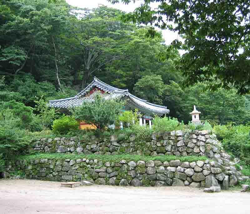 Seokguram Grotto, Gyeongju - A UNESCO World Heritage site featuring a Buddhist cave temple with a stunning statue of Buddha.