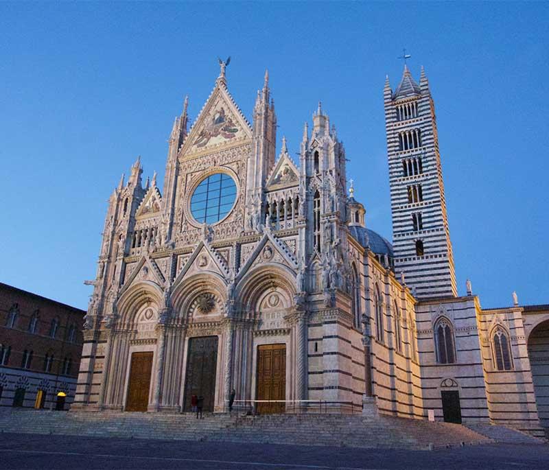 Siena Cathedral, Siena, a stunning Gothic cathedral known for its façade, beautiful interior, and the Piccolomini Library.