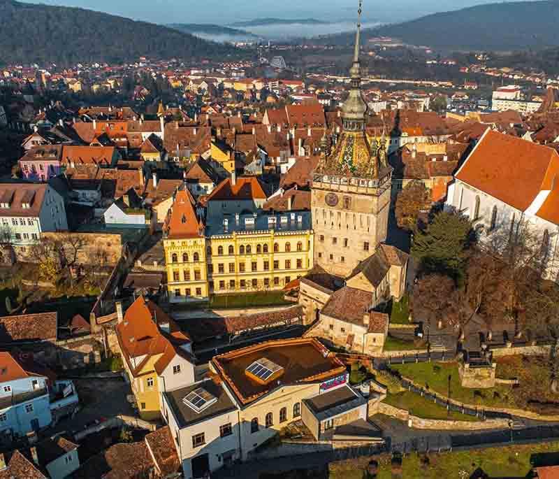 Sighișoara - Medieval citadel town, birthplace of Vlad the Impaler, with well-preserved fortifications and colorful houses.