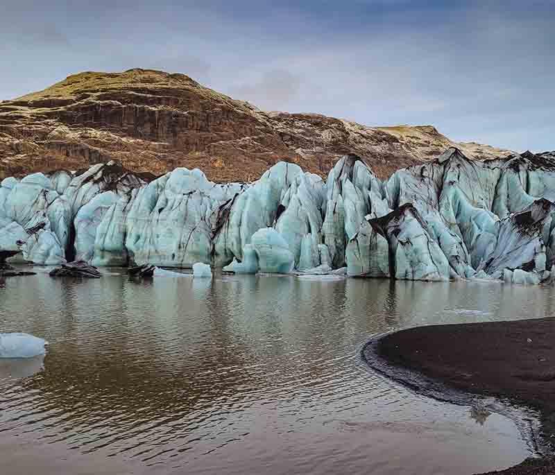 Sólheimajökull Glacier, a glacier in southern Iceland, popular for adventurous glacier hiking and ice climbing.