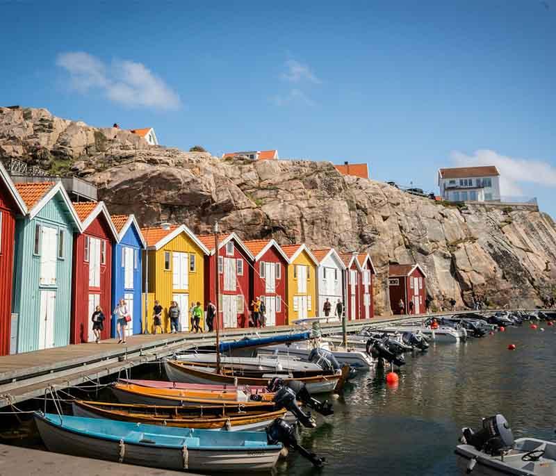 Smögen - A picturesque fishing village known for its colorful houses, seafood, and lively summer atmosphere.