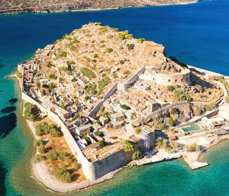 Spinalonga Island, a small island off the coast of Crete, known for its Venetian fortress and as a former leper colony.