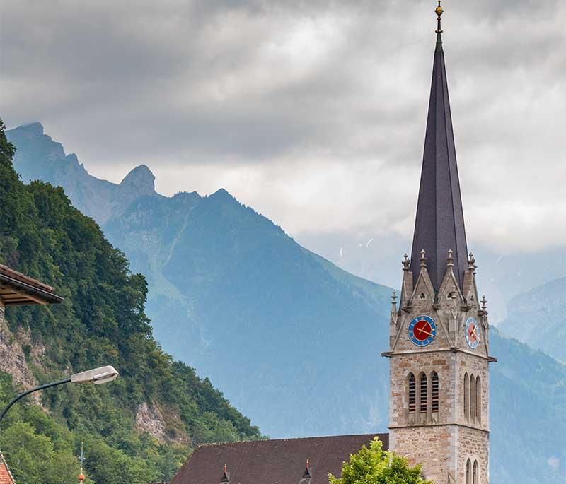 St. Florin Cathedral, a neo-Gothic cathedral in Vaduz, known for its beautiful architecture and stained glass windows.