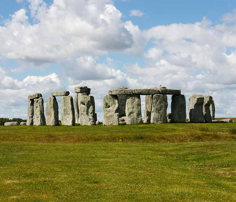 Stonehenge, Wiltshire - A prehistoric monument and UNESCO World Heritage site, known for its mysterious stone circle.