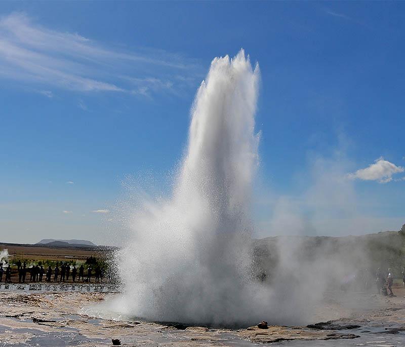 Strokkur Geysir, a highly active geyser in the Geysir Geothermal Area, known for its frequent and impressive eruptions.