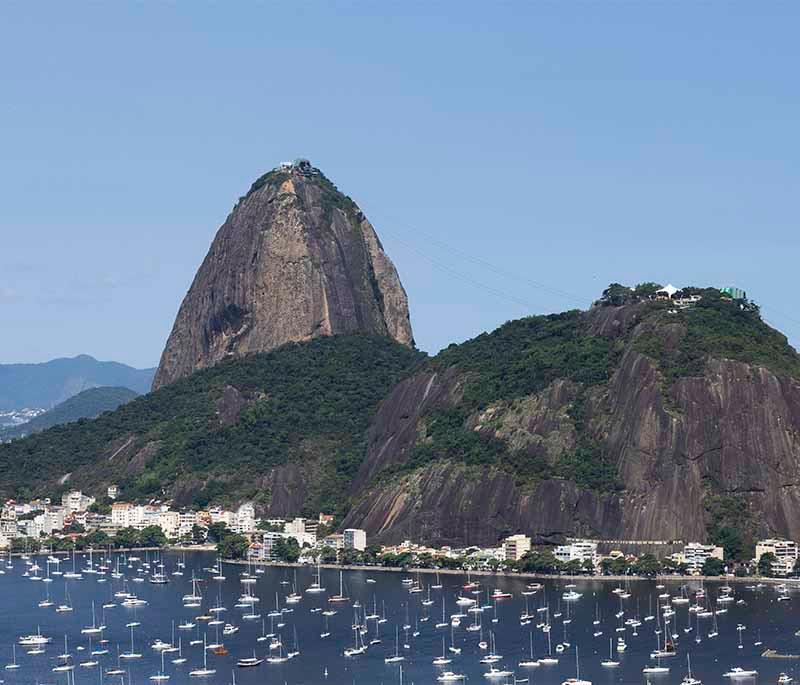 Sugarloaf Mountain, Rio de Janeiro, offering stunning panoramic views of the city and the bay, accessible by cable car.