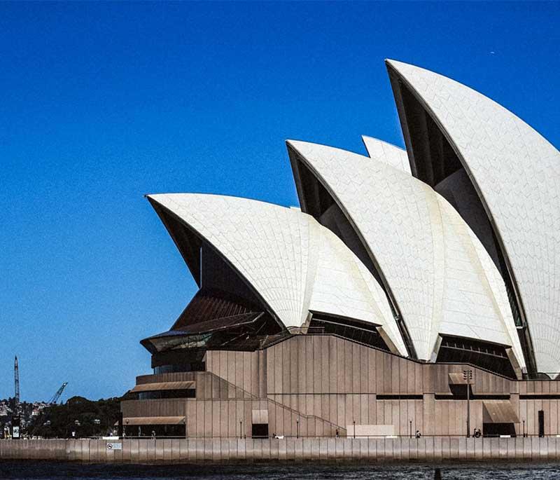 Sydney Opera House in Sydney, New South Wales, is an iconic architectural masterpiece and a hub of performing arts.