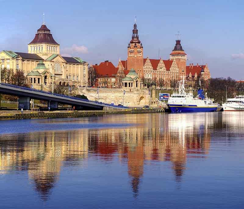 Szczecin’s Wały Chrobrego Promenade - Promenade with panoramic views of the Oder River and historic buildings.