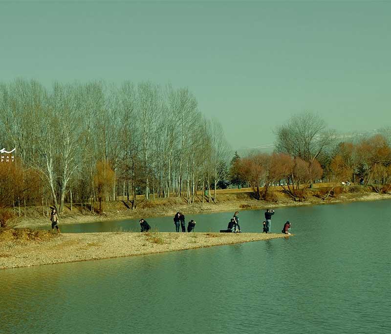 Taanayel Lake, a peaceful lake in the Bekaa Valley, surrounded by farmland and ideal for picnics and nature walks.