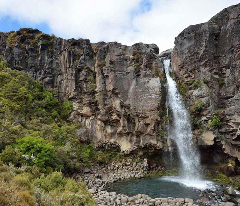 Taranaki Falls, Tongariro National Park - A picturesque waterfall with a scenic hiking trail through volcanic landscapes.