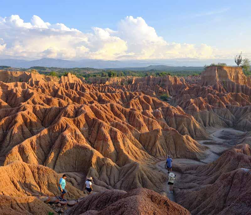 Tatacoa Desert, featuring dramatic landscapes of red and grey rock formations, ideal for stargazing and exploring.