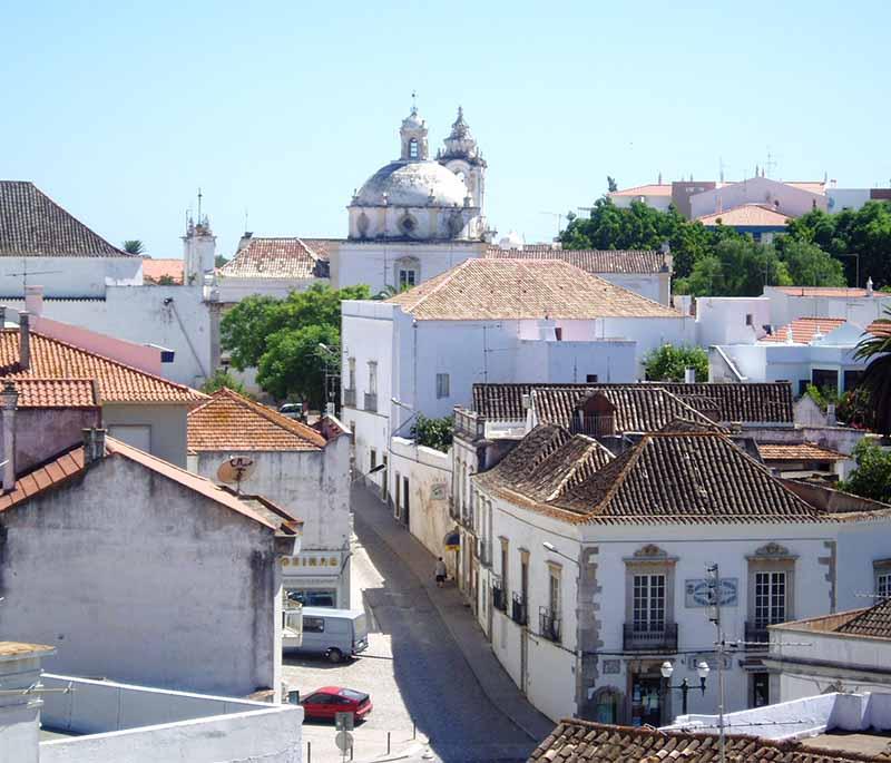 Tavira - A charming town in the Algarve with a rich history, featuring beautiful churches, Roman bridges, and sandy beaches.