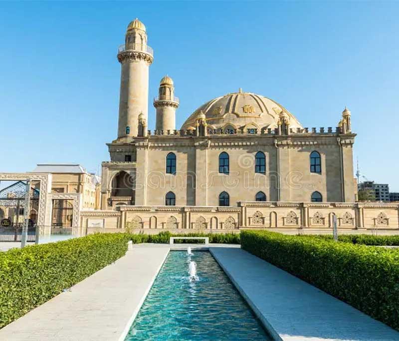 Taza Pir Mosque, Baku, featuring the grand mosque with intricate Islamic architecture and a large prayer hall.