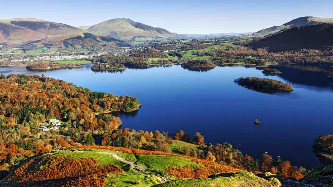 The Lake District in the United Kingdom, a stunning national park in Cumbria known for its lakes and mountains.