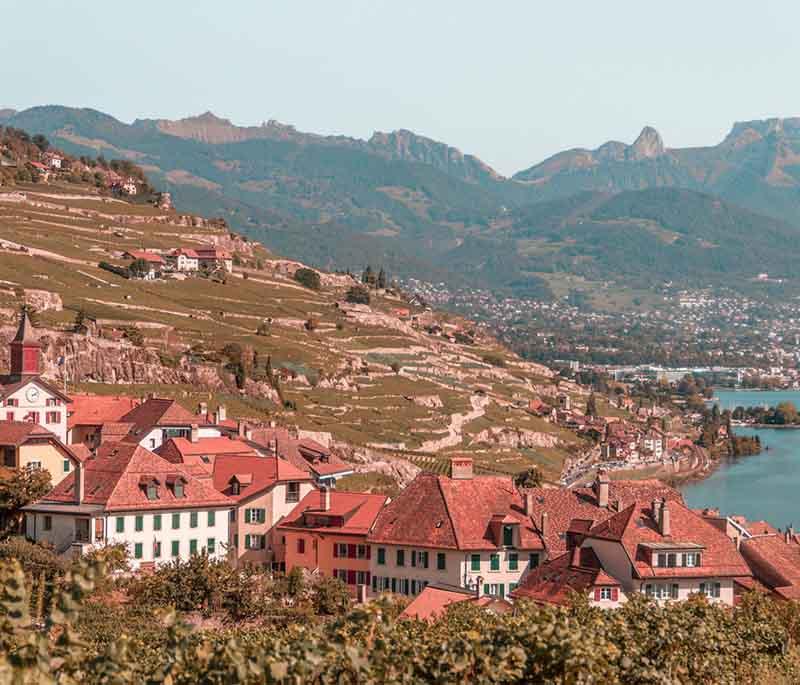 The Lavaux Vineyards - A UNESCO World Heritage site known for its terraced vineyards overlooking Lake Geneva.