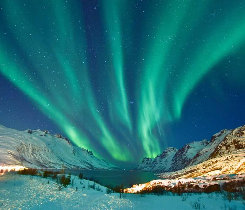 The Northern Lights (Aurora Borealis) - Best viewed in northern Norway, especially during the winter months.