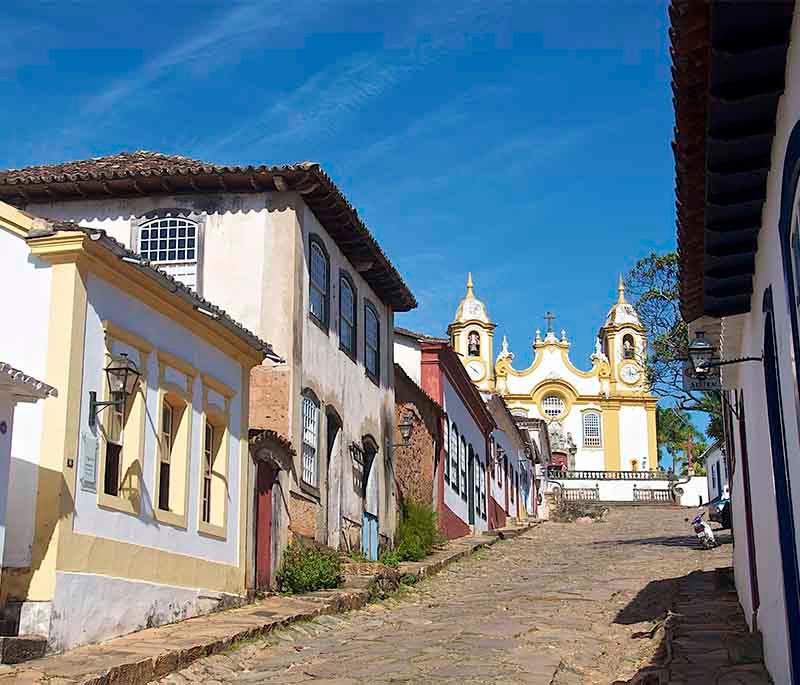 Tiradentes, a well-preserved colonial town with historic churches, cobblestone streets, and rich cultural heritage.