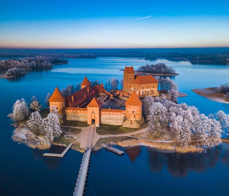 Trakai Castle: Medieval castle on an island in Lake Galvė, known for its stunning setting and historical significance.