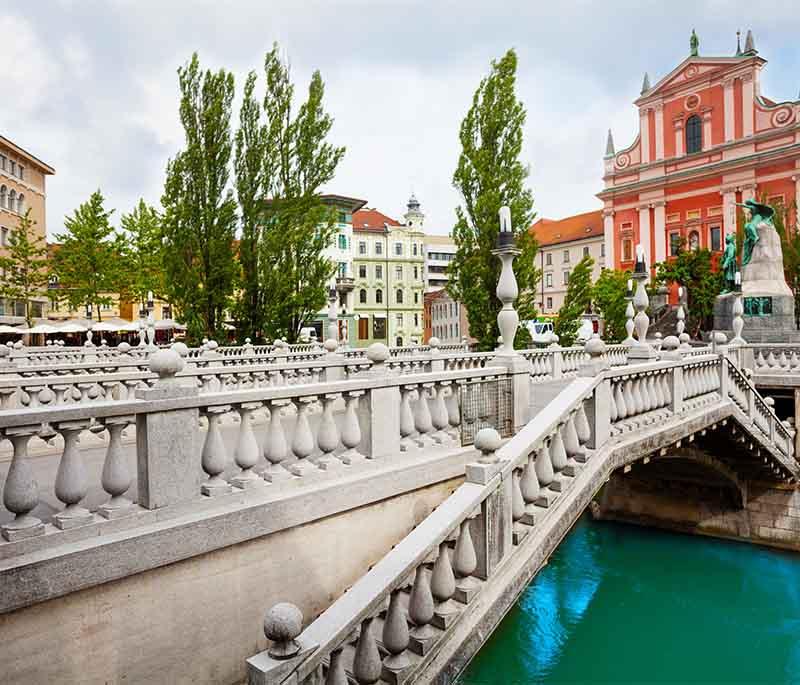 Triple Bridge (Tromostovje) - An iconic set of three bridges in Ljubljana, designed by architect Jože Plečnik.