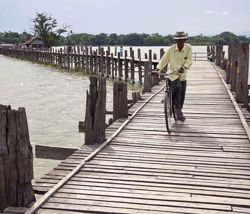 U Bein Bridge, Mandalay - The longest teakwood bridge in the world, offering stunning sunset views and photogenic scenes.