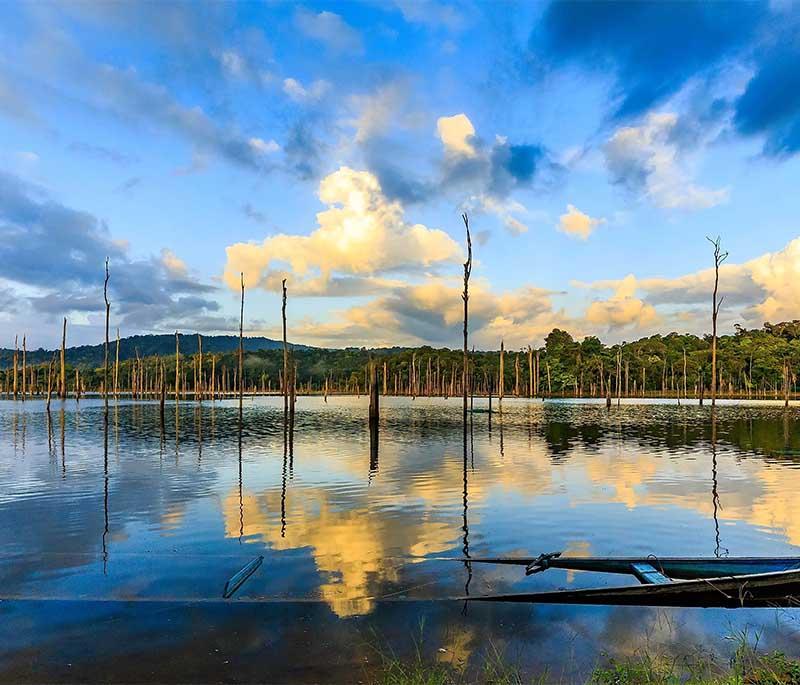 Van Blommestein Lake - A large reservoir offering water sports, fishing, scenic views, and recreational activities.