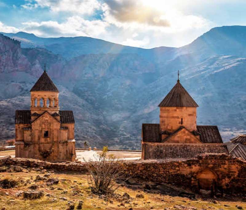 Vayots Dzor Province, highlighting diverse landscapes from rocky mountains to ancient monasteries, with beauty.