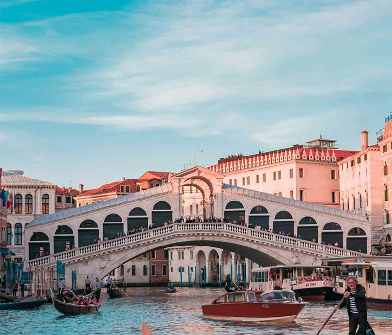 Venice Canals, Venice, waterways traversed by gondolas and vaporettos, offering a unique way to explore the city.