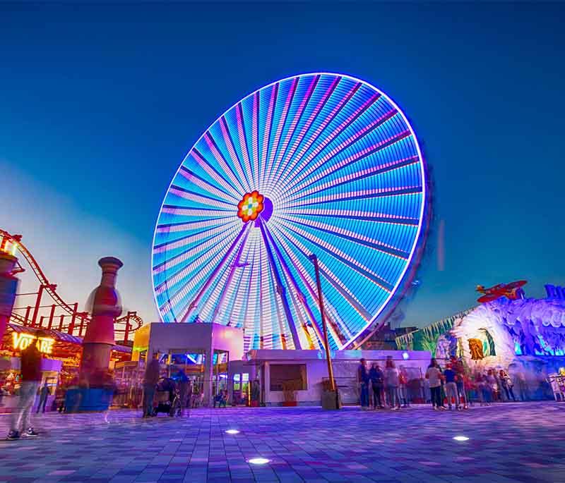 Vienna Prater in Vienna: Blend of historic amusement rides and modern attractions, featuring the famous Giant Ferris Wheel.