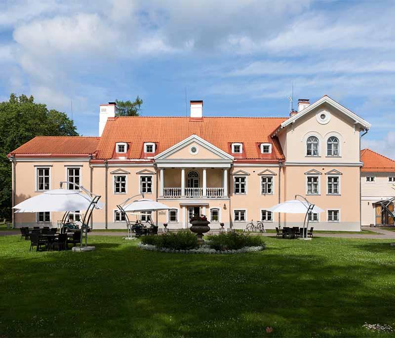 Vihula Manor, a beautifully restored manor complex offering luxury accommodation, spa services, and scenic surroundings.