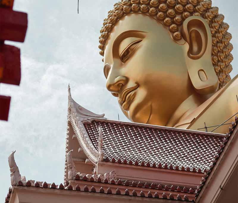 Wat Pho (Temple of the Reclining Buddha), Bangkok - Famous temple with a massive reclining Buddha statue.