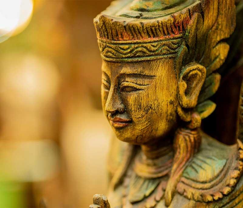 Wat Phra That Doi Kham, Chiang Mai - A temple on a hill offering beautiful views and a revered statue of Buddha.