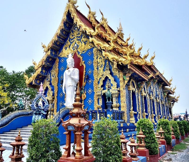 Wat Rong Khun (Blue Temple), Chiang Rai - Exquisite blue-hued temple adorned with intricate artistic details.