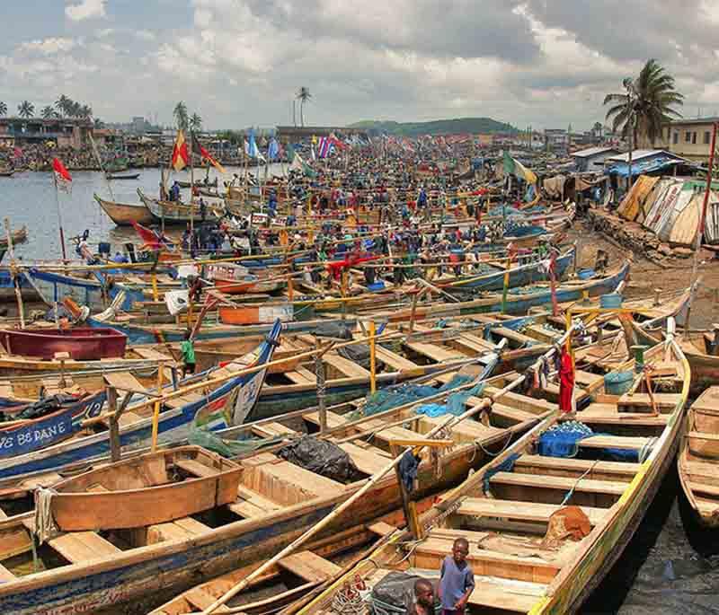 Winneba Fishing Harbour, a bustling fishing port known for its vibrant market and traditional fishing practices.