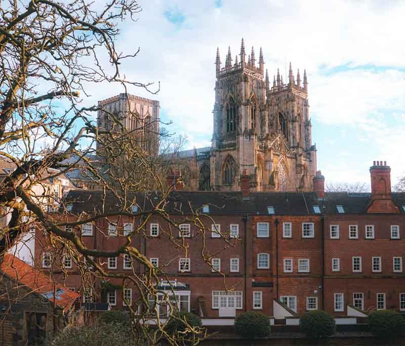 York Minster, York - A magnificent Gothic cathedral known for its stunning architecture and beautiful stained glass windows.