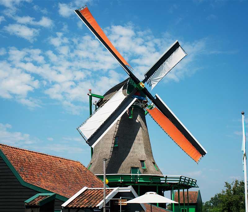 Zaanse Schans, Zaandam: Open-air museum with historic windmills and traditional crafts, a glimpse into Dutch heritage.