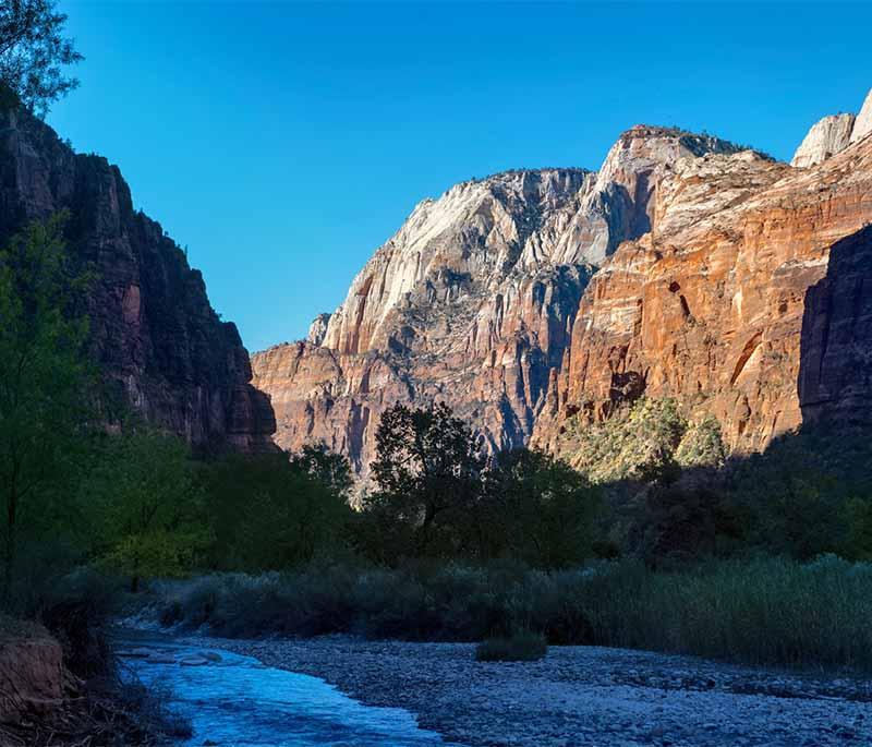 Zion National Park, Utah - Known for its stunning sandstone cliffs, narrow canyons, and outdoor adventures.